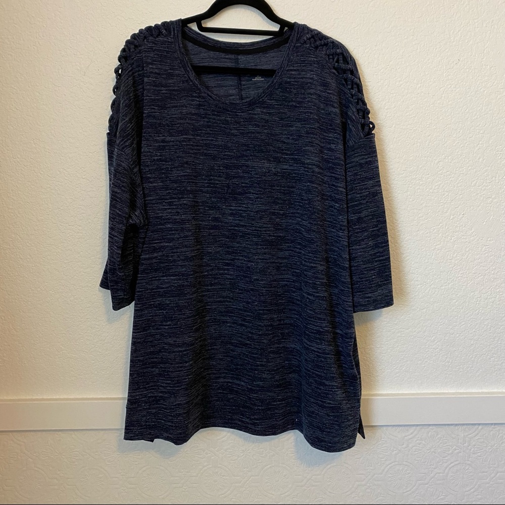 Women’s top with cutout shoulder design